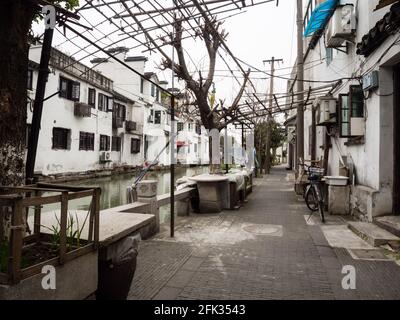 Suzhou, China - March 23, 2016: Peaceful moment in the courtyard of Suzhou old town along the water canals Stock Photo