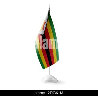 Small national flag of the Zimbabwe on a white background Stock Photo