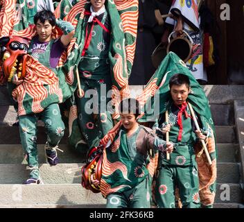 Takayama, Japan - October 9, 2015: Lion dance performers during annual Takayama festival, one of the most famous festivals in Japan Stock Photo