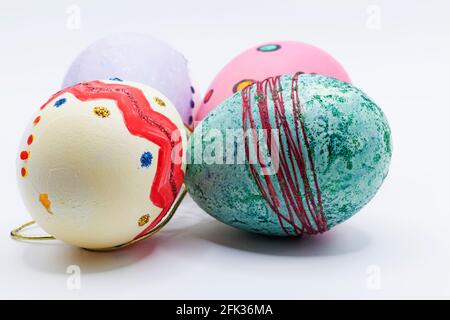 four hand-painted Easter eggs on white background Stock Photo