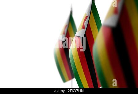 Small national flags of the Zimbabwe on a white background Stock Photo