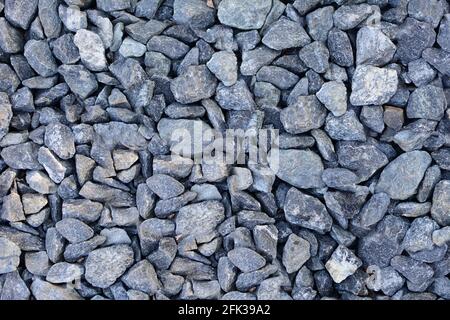 Background of gray gravel. Full frame gray gravel texture and pattern. Stock Photo