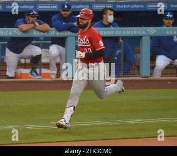 Cincinnati Reds' Jesse Winker (33) runs the bases after hitting a home run  during the first inning of a baseball game against the Los Angeles Dodgers  Tuesday, April 27, 2021, in Los