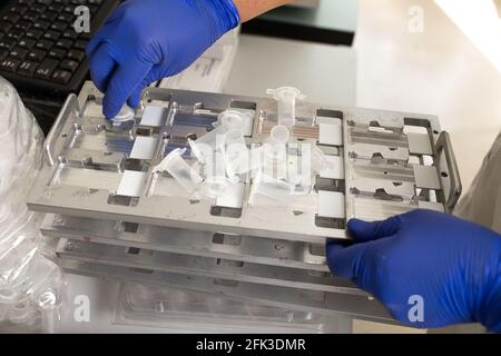 Lab technician works with gloves in hospital. Stock Photo