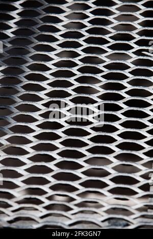 Steel grid floor on factory. Close-up of grid's pattern. Stock Photo