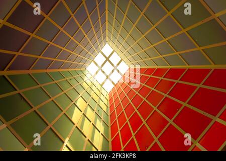 Vertical view of skylight in tower with strong geometric patterns as abstract background Stock Photo