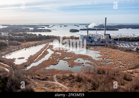 Aerial view of the pond Suomenoja, one of the best places for birdwatching in Espoo, Finland. The combined heat and power plant on the Baltic seashore Stock Photo