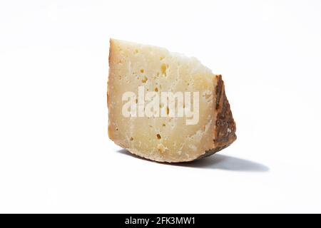 a piece of aged pecorino cheese in white background Stock Photo