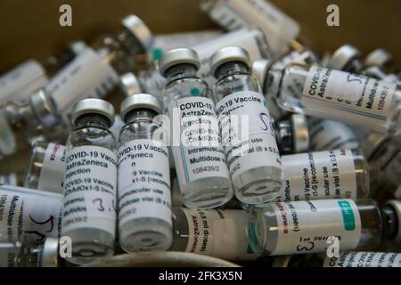 London, UK 27 April 2021 - Empty bottles of Oxford AstraZeneca Covid-19 vaccine at a vaccination centre in London. Credit Dinendra Haria /Alamy Live News
