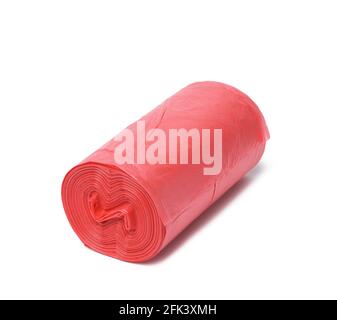 Roll of red garbage bags isolated on white Stock Photo by