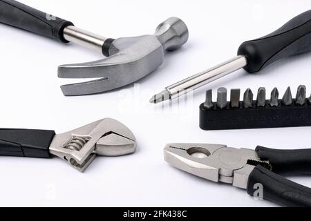 Set of metal working tools on white background. Stock Photo