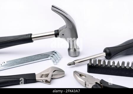 Set of metal working tools on white background. Stock Photo