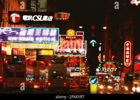 Illuminated neon street signs at night in Nathan Road, Kowloon, Hong Kong, China, Asia Stock Photo