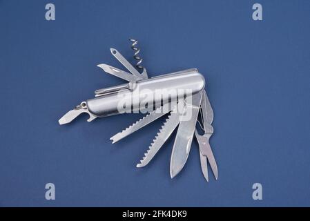 Swiss many task army knife. Multi tool pocket knife. Stock Photo