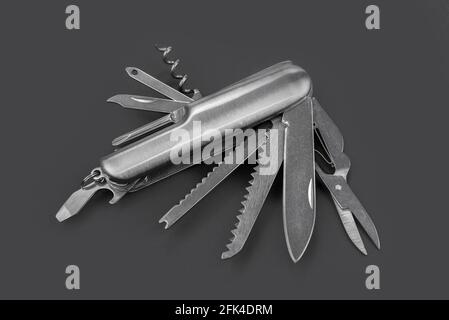 Swiss many task army knife. Multi tool pocket knife. Stock Photo