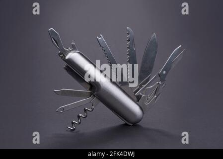 Swiss many task army knife. Multi tool pocket knife. Stock Photo