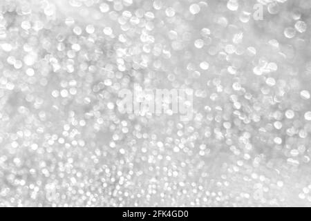 Defocused bokeh. Abstract background white bokeh lights different circles for Christmas and happy new year holiday background Stock Photo