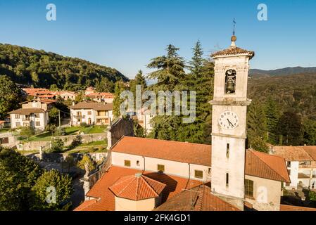 Aerial view of the Parish Church chapel of Sant Appiano in ancient village Castello Cabiaglio, situated in province of Varese, Lombardy, Italy Stock Photo