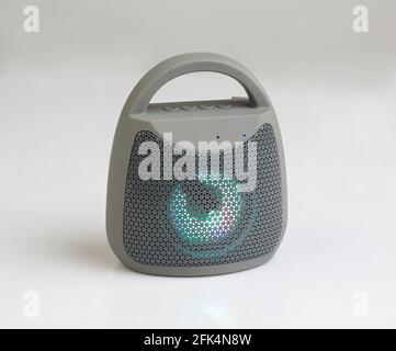 Cute designed speaker with lighting isolated on white background Stock Photo