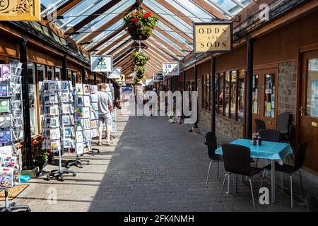 Interior of Great Torrington Pannier Market, Shops and Glass Roof Detail Looking Towards the Main Town Entrance and Torrington Square #3. Stock Photo