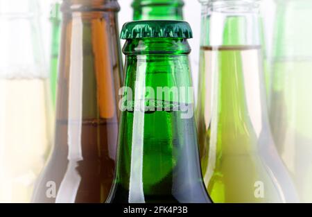 beer bottles close up, green, yellow and brown beer bottles Stock Photo