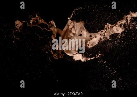 abstract liquid color splash on black background Stock Photo