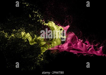 abstract liquid color splash on black background Stock Photo