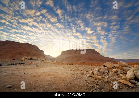 Masada, Israel ancient rock plateau fortress in the Judaean Desert at sunset. Stock Photo