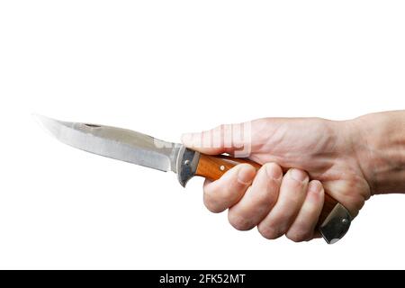 Closeup humans hand holds a folding knife with a wooden handle isolated on white Stock Photo