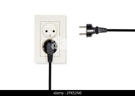 Closeup beige double electrical outlet and two black cables with plugs isolated on a white. Stock Photo