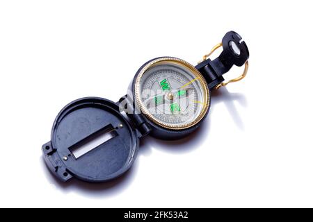 Open small pocket compass isolated on white Stock Photo