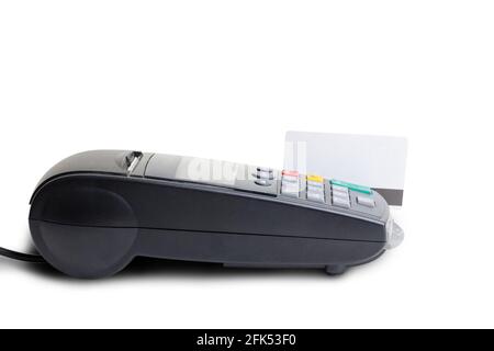 Payment terminal and the mockup of a plastic card isolated on white. Copyspace. Clipping path. Stock Photo