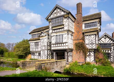Little Moreton Hall a grade1 listed building black and white half timbered Tudor manor house with a moat Congleton Cheshire England GB UK Europe