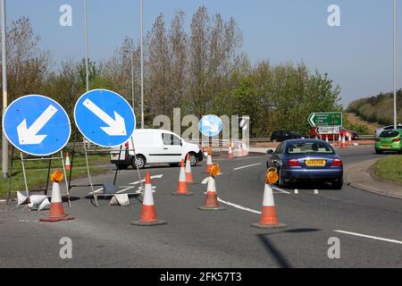 Lane Closure on A78 from Dutch House Roundabout Photo shows lane restriction as cars come off the the roundabout Stock Photo