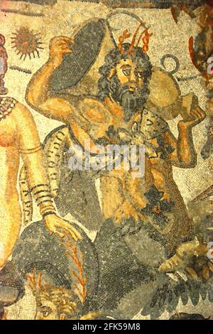 An ancient roman mosaic depicting the Titan Oceanus. From the Hall of Arion in the UNESCO listed Ancient Roman mosaics in the Villa Romana del Casale, Stock Photo