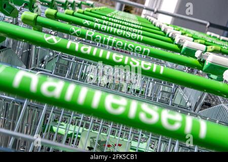 row of Raiffeisenmarkt shopping carts Stock Photo