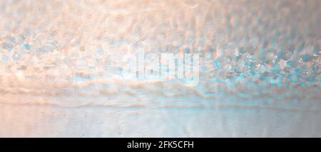 Wavy with rainbow colors abstract rippled water texture background Stock Photo