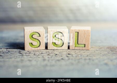 SSL Written On Wooden Blocks On A Board - Secure Internet Concept Stock Photo