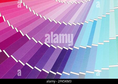 Closeup of multicolored palette with color swatches background Stock Photo