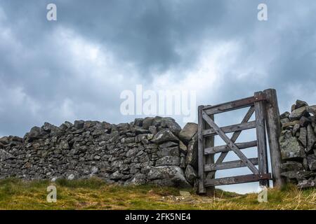 A Wooden Gate In An Old Dry Stone Wall In Scotland, With Copy Space Stock Photo
