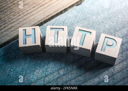 HTTP Written On Wooden Blocks On A Board, Insecure Internet Concept Stock Photo