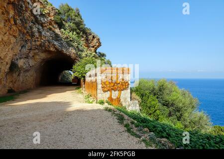Tunnel entrance to Zingaro Reserve Park, from Scopello, Trapani province, Sicily, Italy. Stock Photo