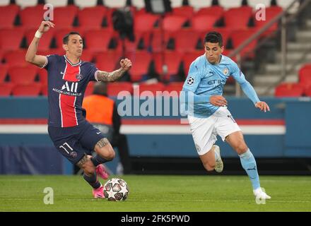 Paris Saint-Germain's Angel Di Maria (left) and Manchester City's Joao Cancelo in action during the UEFA Champions League Semi Final, first leg, at the Parc des Princes in Paris, France. Picture date: Wednesday April 28, 2021. Stock Photo