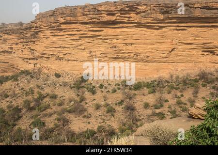 Cliff dwellings along the base of the Bandiagara escarpments, Mali Stock Photo