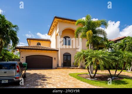 Photo series of single family homes in Golden Shores neighborhood in Sunny Isles Beach Florida USA Stock Photo