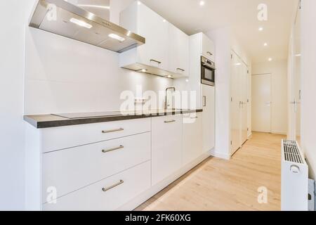 New apartment with modern kitchen Stock Photo