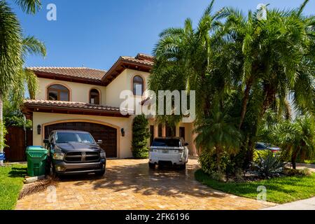 Photo series of single family homes in Golden Shores neighborhood in Sunny Isles Beach Florida USA Stock Photo