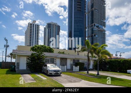 Photo series of single family homes in Golden Shores neighborhood in Sunny Isles Beach Florida USA Stock Photo