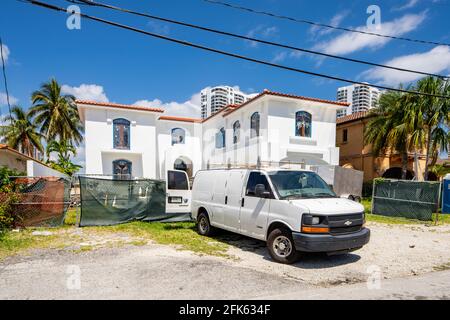 Photo series of single family homes in Golden Shores neighborhood in Sunny Isles Beach Florida USA Stock Photo