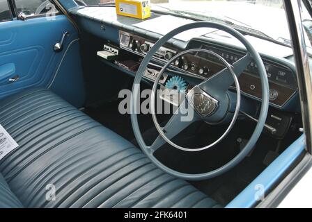 The front interior of a 1965 Ford Zephyr parked up on display at the English Riviera classic car show, Paignton, Devon, England, UK. Stock Photo